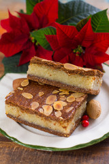 Almond stuffed Christmas cookies on Christmas decorated table