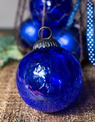 Fotobehang Old vintage cobalt blue Christmas tree balls from glass © barmalini