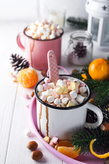 two cups with hot chocolate or cocoa with melted marshmallow