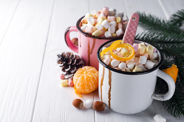 two cups with hot chocolate or cocoa with marshmallow