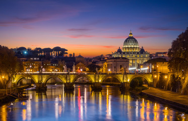 Fototapeta na wymiar Rome skyline at sunset as seen from Umberto I Bridge, Italy.