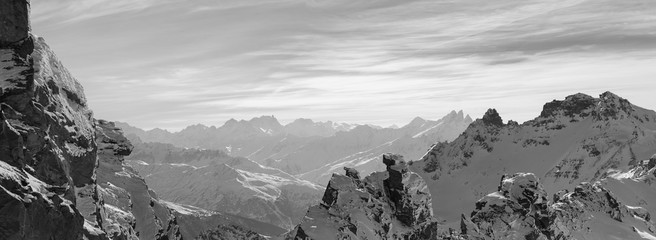 Peaks of French Alps among clouds