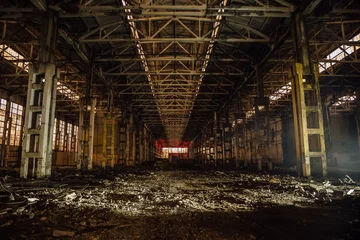  Night at large abandoned industrial hall with garbage. Voronezh excavator manufacturing factory © Mulderphoto