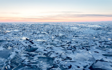 Morning on frozen Baikal lake. Siberia.