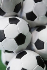 Fototapeta premium Stacked football soccer balls