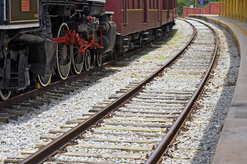 Naklejka premium Close-up of old steam locomotive wheels, now tourist attraction
