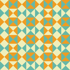 Fototapeta premium Colorful triangles pattern, retro pattern of geometric shapes. Colorful abstract geometric seamless pattern. Colorful mosaic backdrop. Geometric background