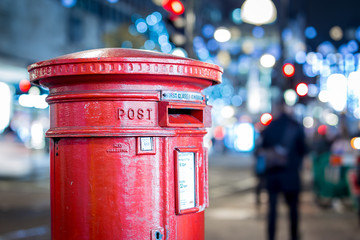 Classic London post box  on the Oxford street in Christmas time