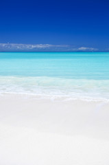 Fototapeta na wymiar Clean White Caribbean Beach With Blue Sky, Antigua