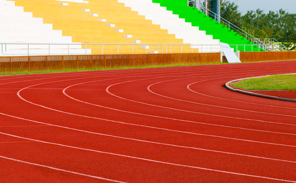 athletics stadium with red track : sport theme