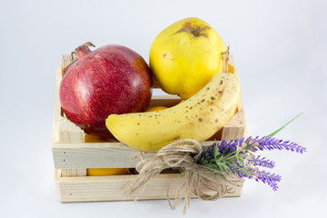 a small crate with fruits