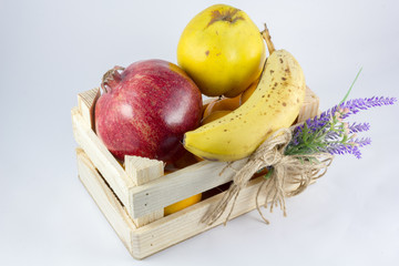 a small crate with fruits