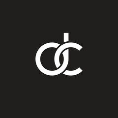 Initial lowercase letter dc, overlapping circle interlock logo, white color on black background