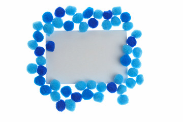 Pompon Mockup.  rectangular frame of bright dark blue and blue little woolen pompoms  isolated on white background. Winter Mock up. 