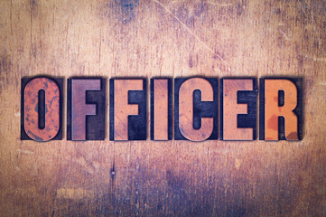 Officer Theme Letterpress Word on Wood Background