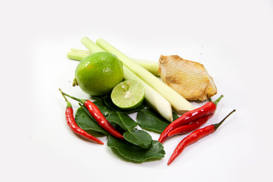 ginger, lemograss, onion, lime leaves, chilli, lemon, Fresh herbs and spices asian ingredients food on block on white background , thai food