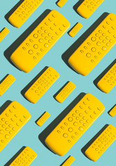 Yellow TV remote repeated pattern background