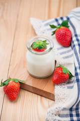 Strawberry Yoghurt. Healthy food with Strawberries and yoghurt breakfast on table.