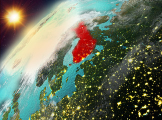 Finland on planet Earth in sunset