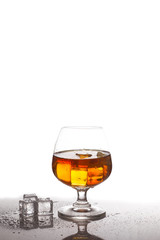 Scotch whiskey with ice cubes.