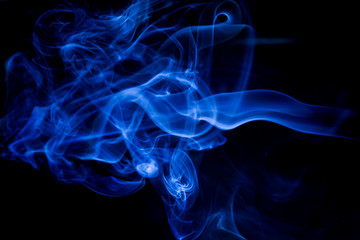 Blue toxic fumes movement on a black background.