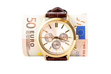 Wrist watch with rolled up euro. Isolated on white. Close up.