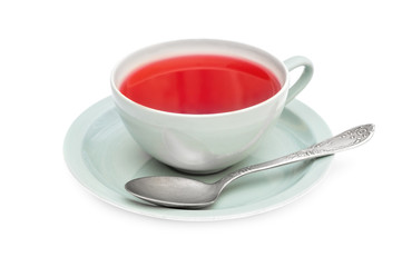 Obraz na płótnie Canvas Cup of tea with tea spoon on white background.