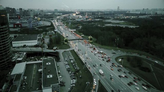 Aerial view of big city highway in the evening rush hour