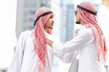 Arab two business man couple quarrels in the city
