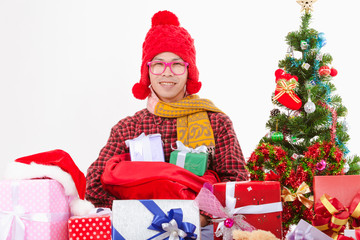 Young man gesture of rejoicing is receiving gifts on Christmas Eve.
