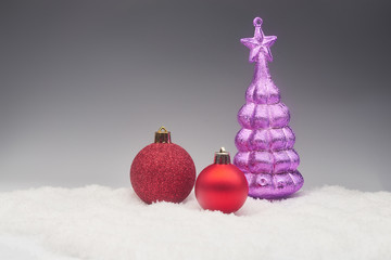 Christmas balls on snow