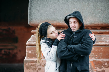 Young couple together . Young romantic couple having fun outside in winter in the old europian city