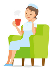 A woman nurse wearing a nurse cap and white coat is sitting on the sofa and drinking coffee