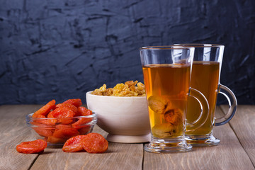 Homemade compote from dried fruits and dried fruits in bowl.Copy space.
