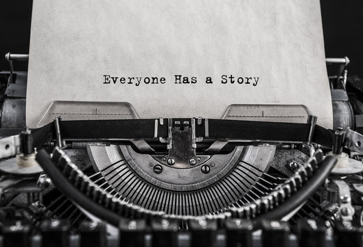 Everyone Has a Story typed words on a old vintage typewriter. Close up
