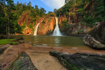 Fototapeta na wymiar Chattrakan waterfall, Beautiful waterwall in Chattrakan nationalpark Pitsanulok province, ThaiLand.