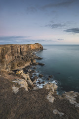Stunning landscape image of cliffs around St Govan's Head on Pembrokeshire Coast in Wales