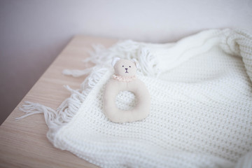 Soft rattle is handmade on white background