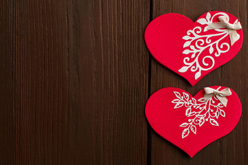 Valentine's day background with valentine card on wooden background