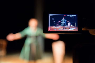 Filming performances of the actress or singer in the interior. A digital video camera. Color led...