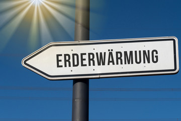 Obraz premium Pralle Sonne und ein Schild mit dem Hinweis auf Erderwärmung