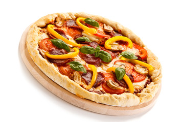 Pizza pepperoni with tomatoes, salami and pepper 