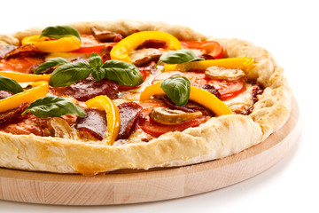 Pizza pepperoni with tomatoes, salami and pepper 