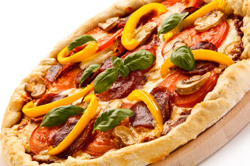 Pizza pepperoni with tomatoes, salami and pepper 