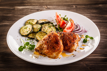     Barbecued chicken leg with vegetables 