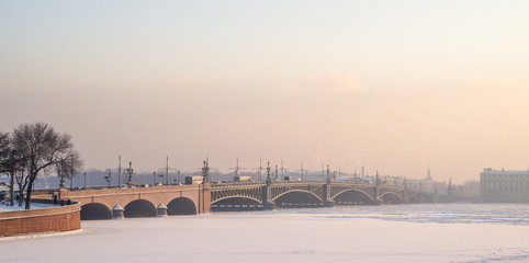 Winter cityscape with the sun, frost and fog. Saint Petersburg in Winter.
