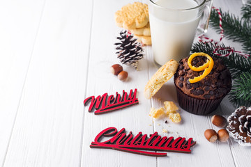 chocolate muffins with jug with milk