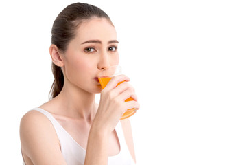 Woman holding orange juice isolated on white background