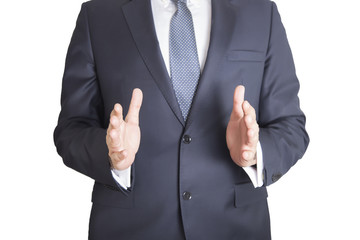 Close up of businessman in blue suit holding something on white background 