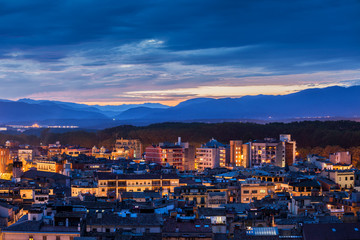 Fototapeta na wymiar City Of Girona Twilight Cityscape In Catalonia, Spain
